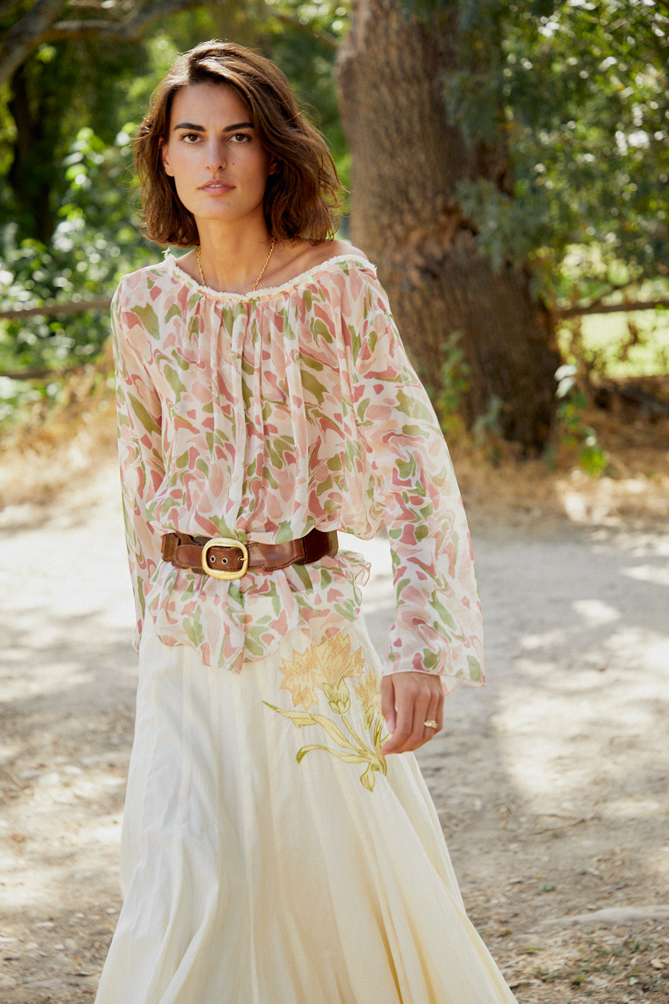 Pastel printed blouse with gathered neckline and loose long sleeves