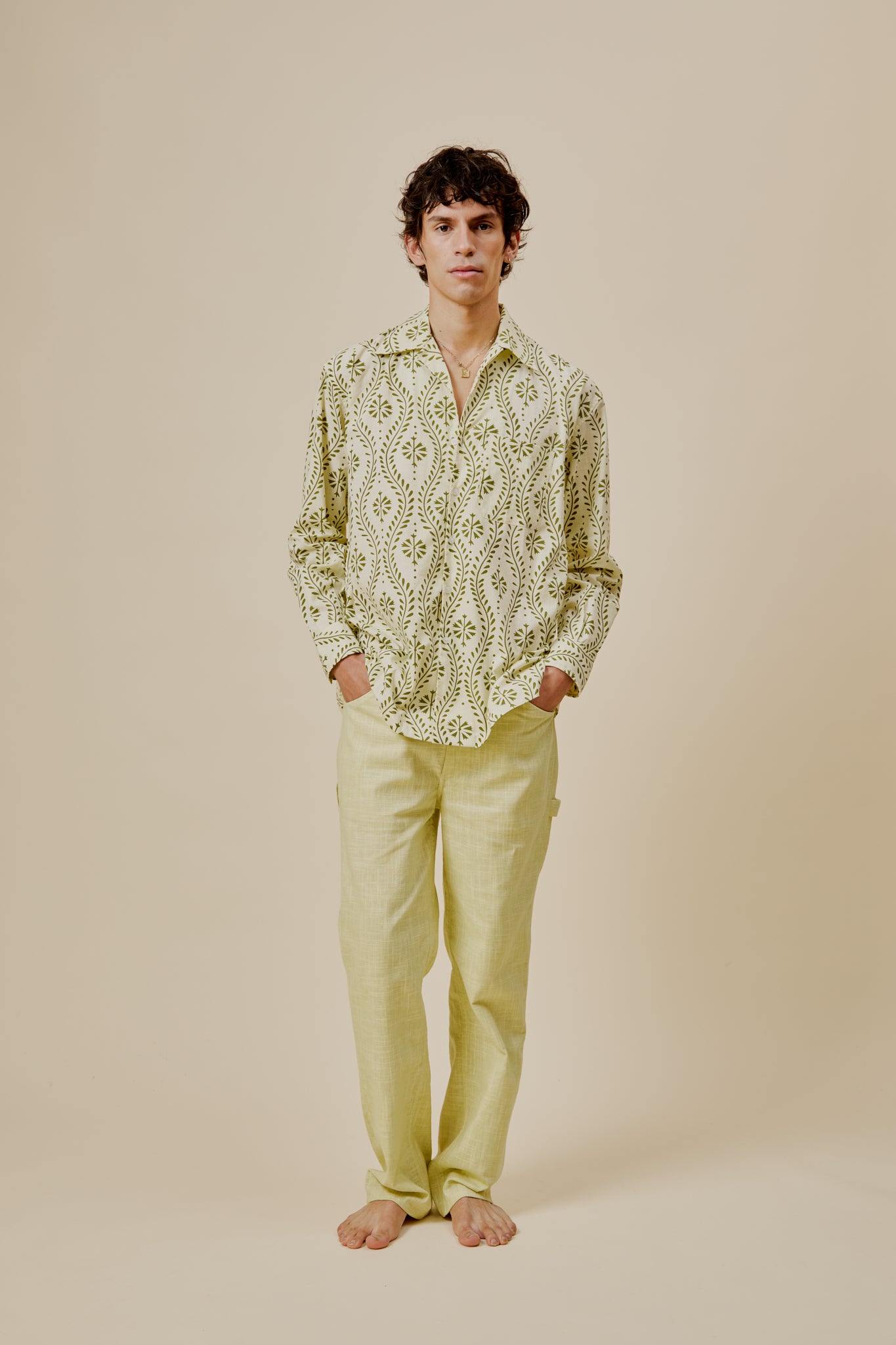 Green leaf-and-flower print button shirt with long sleeves, relaxed fit