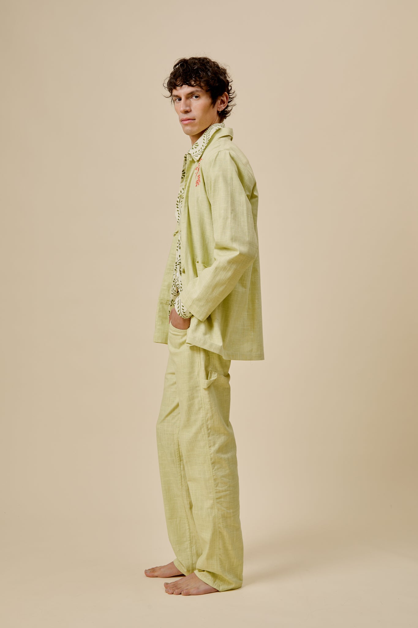Cecil trousers, light yellow with relaxed straight cut, side profile view
