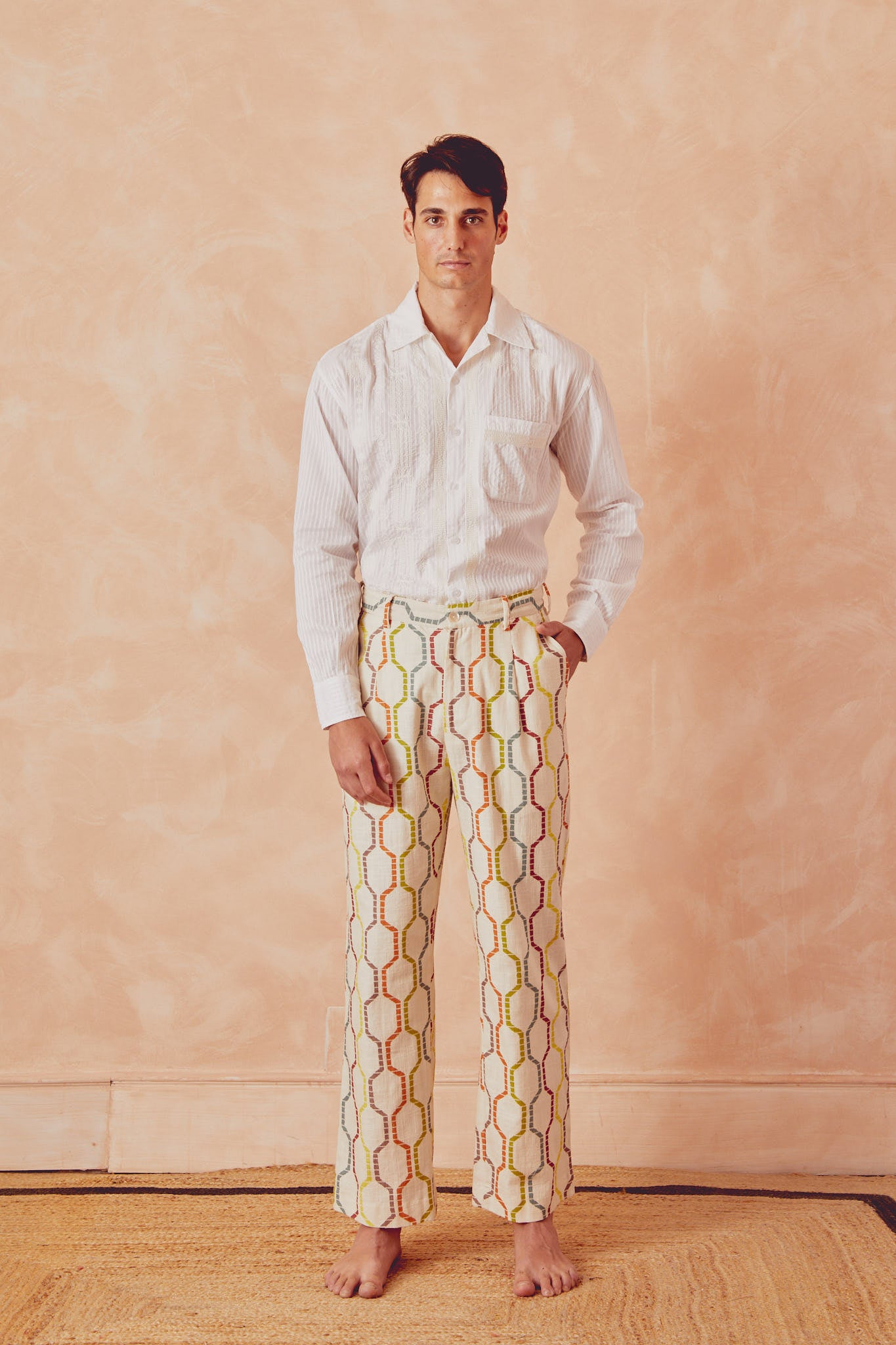 Tony trousers full length, off-white with multicolor linked pattern and tie waist.