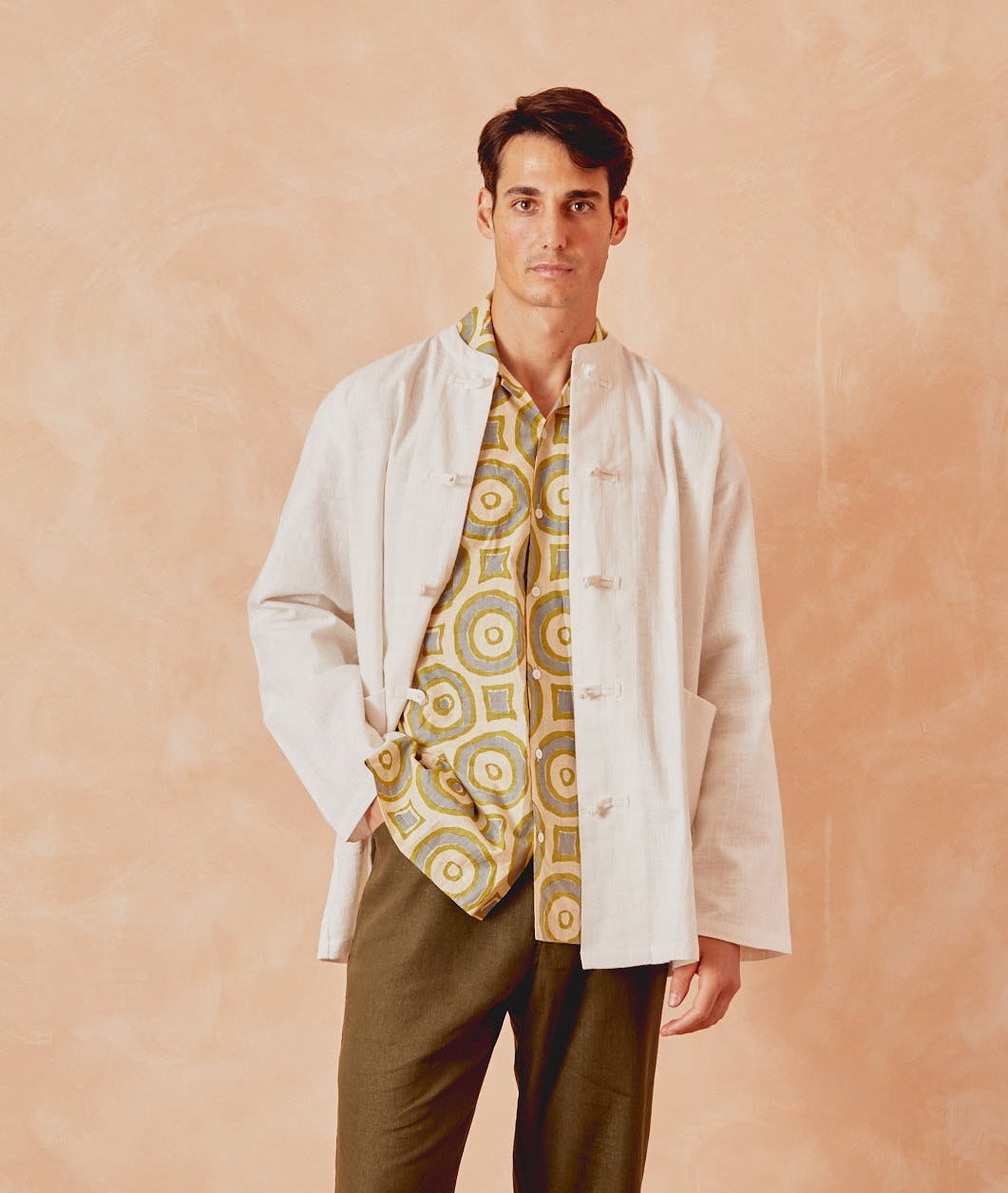 Cream kitchen overshirt with three-button placket and chest patch pocket