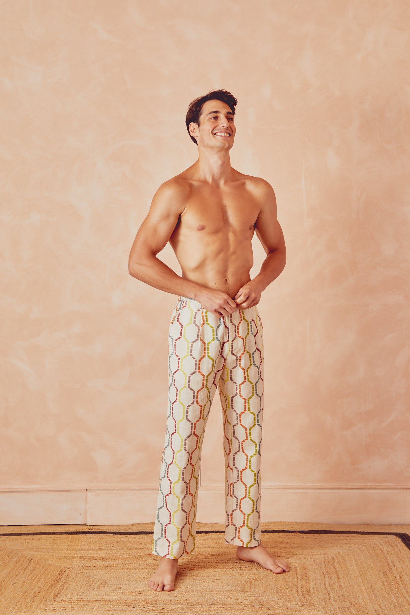 Tony trousers front view, off-white with multicolor linked pattern.