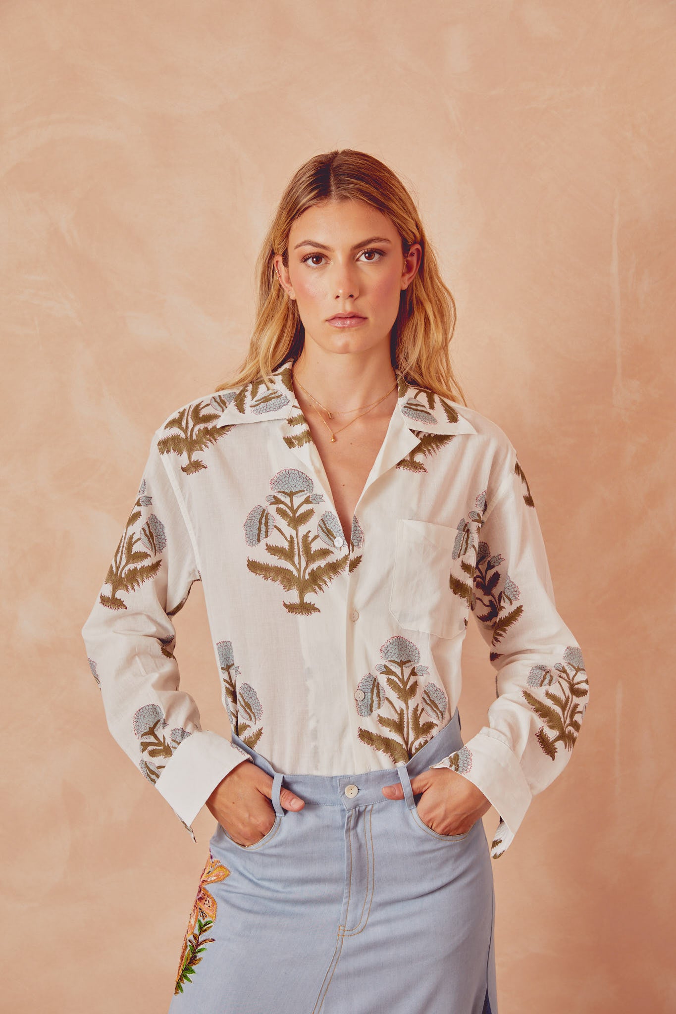 White button-up shirt with botanical floral print and chest pocket, long sleeves
