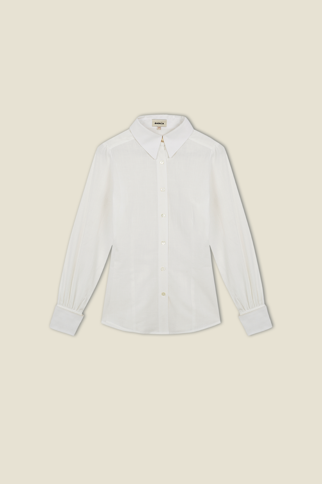 White Dahlia shirt with spread collar, front buttons, and long sleeves