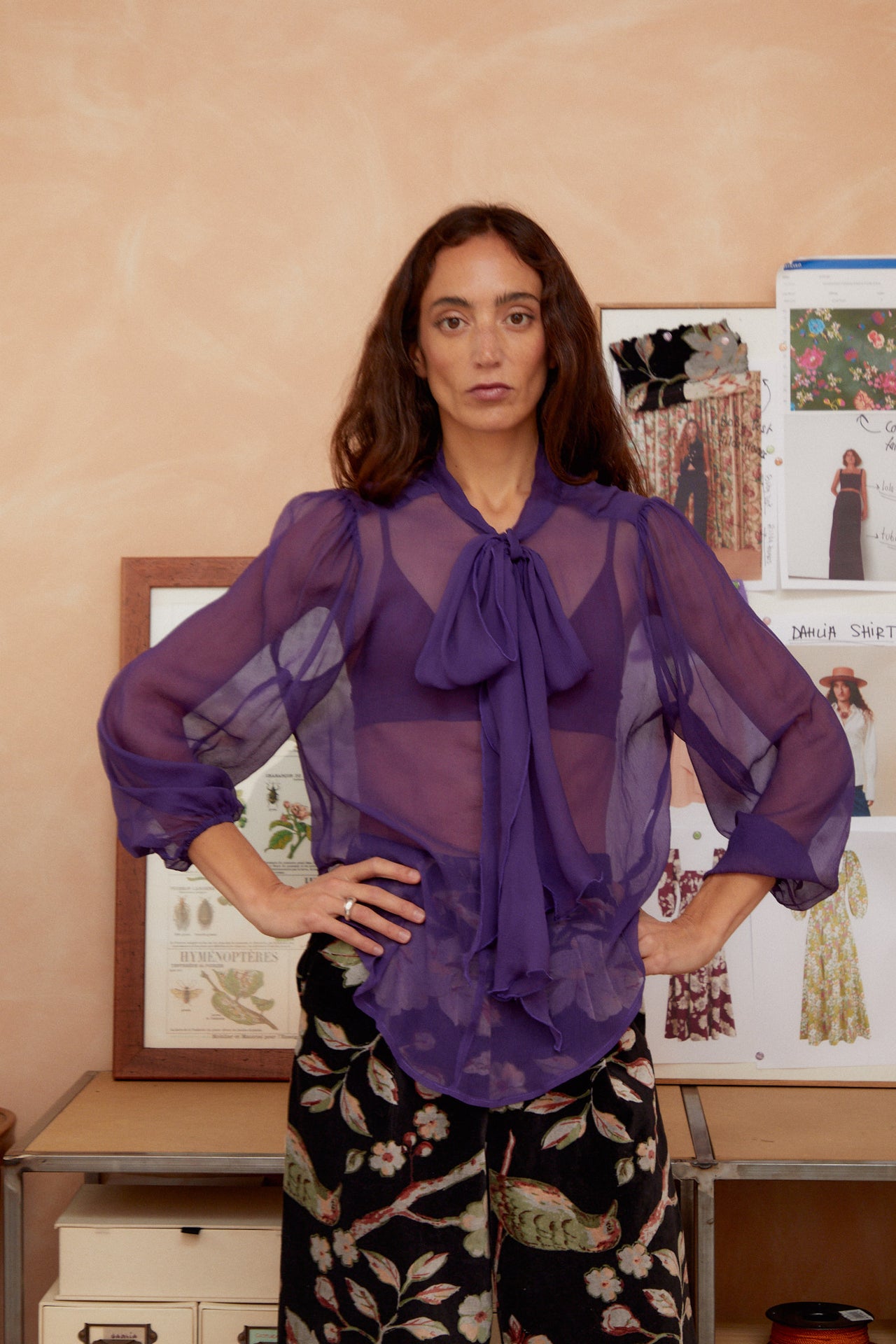 Purple sheer tie-neck blouse with draped bow and voluminous sleeves