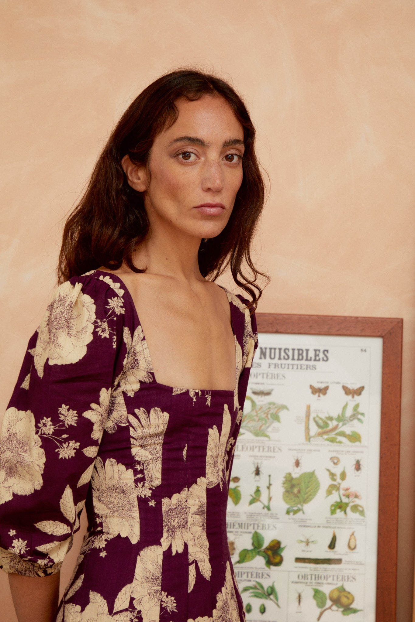 Aurelia dress close-up: aubergine floral bodice, square neckline, puff sleeves