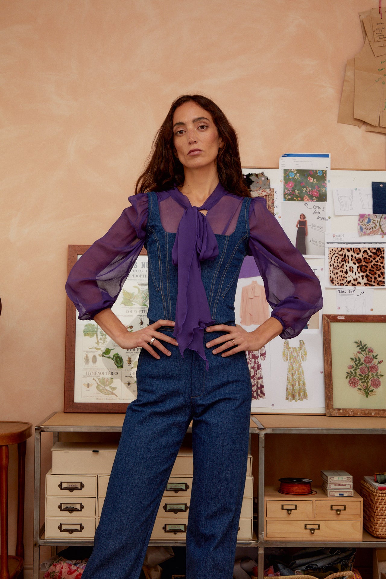 Denim corset top with button placket, curved neckline, and vertical seaming
