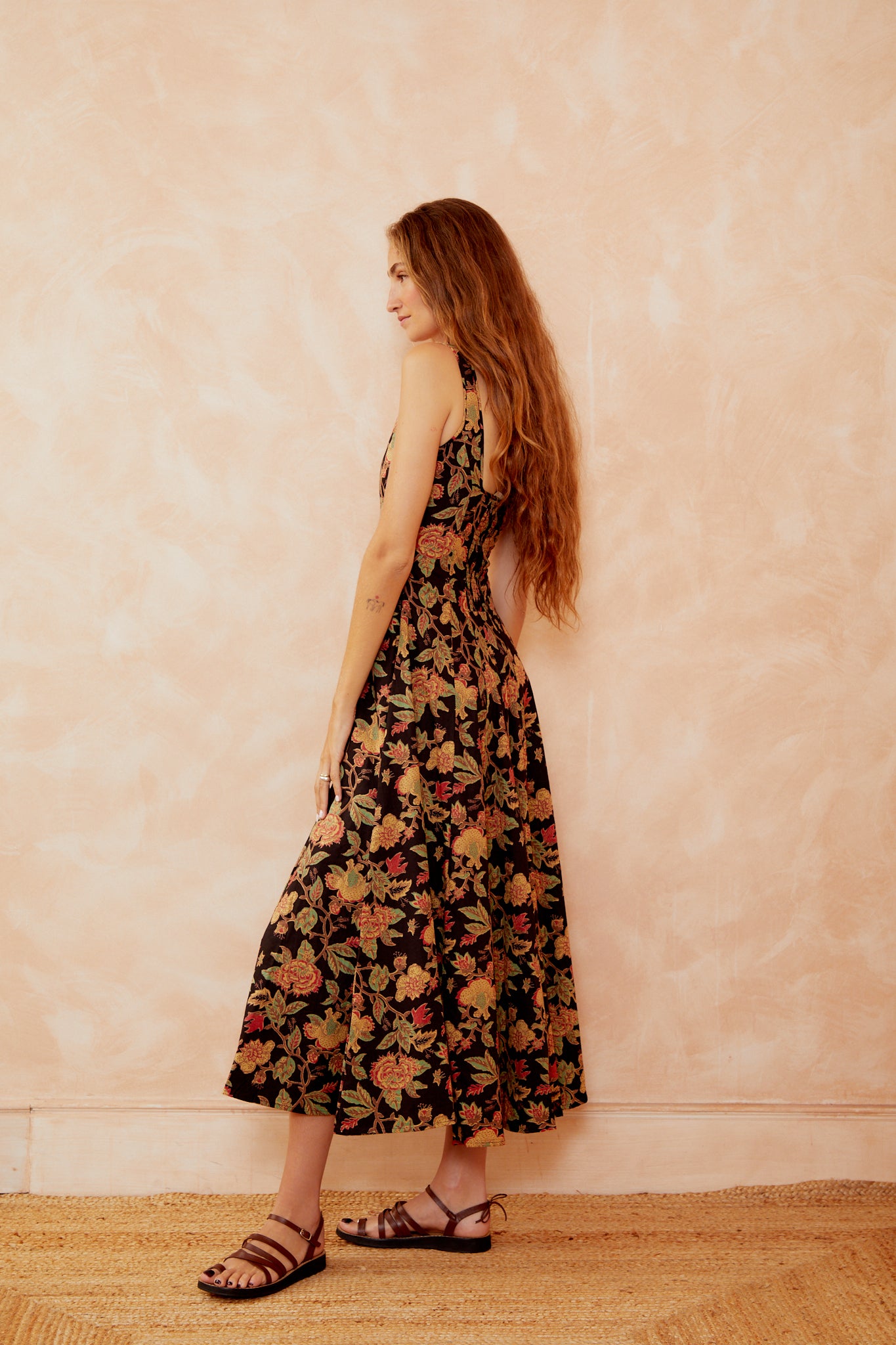 Floral maxi dress side profile, square neckline, wide straps, full gathered skirt