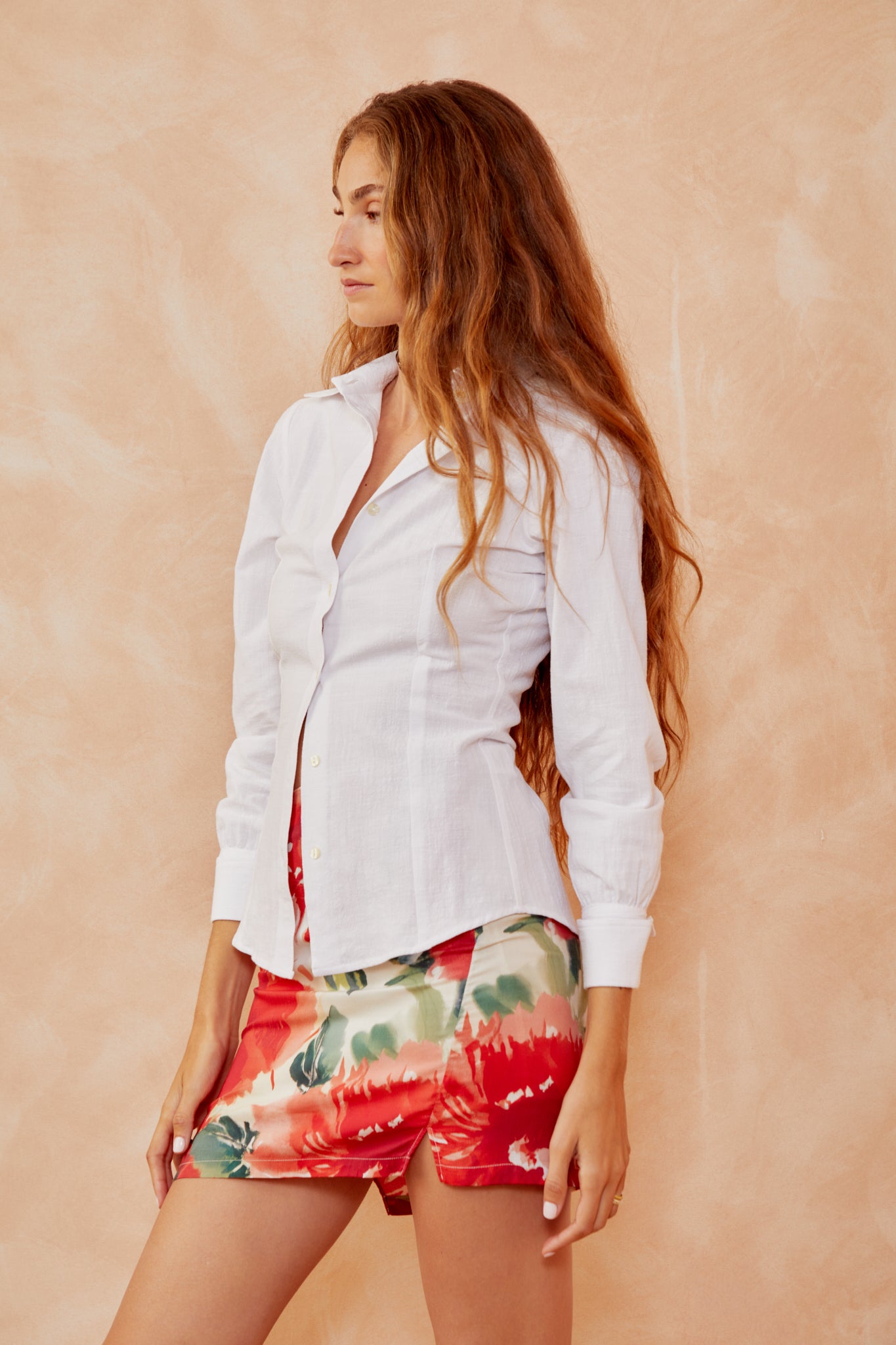 White long-sleeve button-up shirt, side view with collar