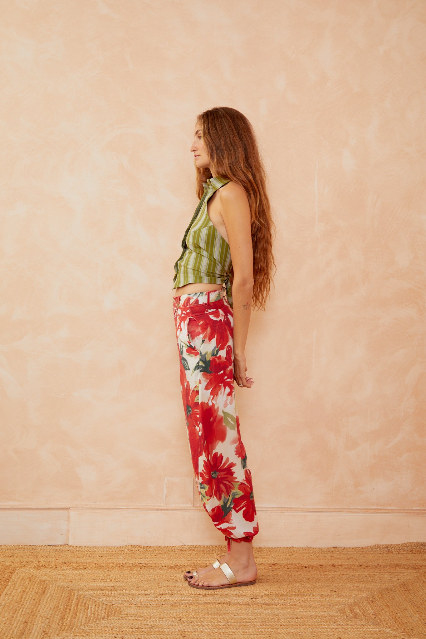 Red and white floral trousers with wide legs, ankle length