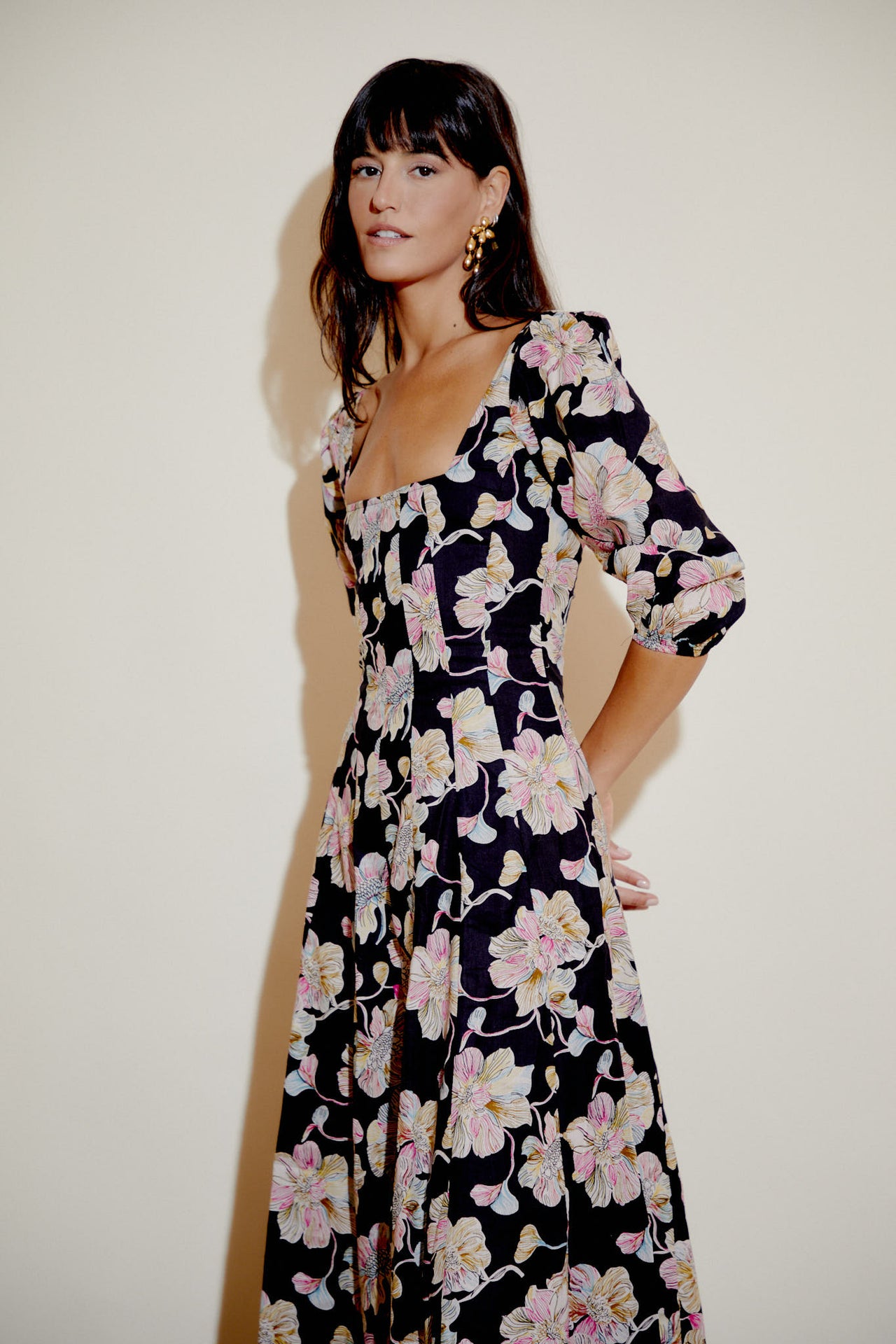 Aurelia dress, black base with pink floral print, square neck and elbow puff sleeves