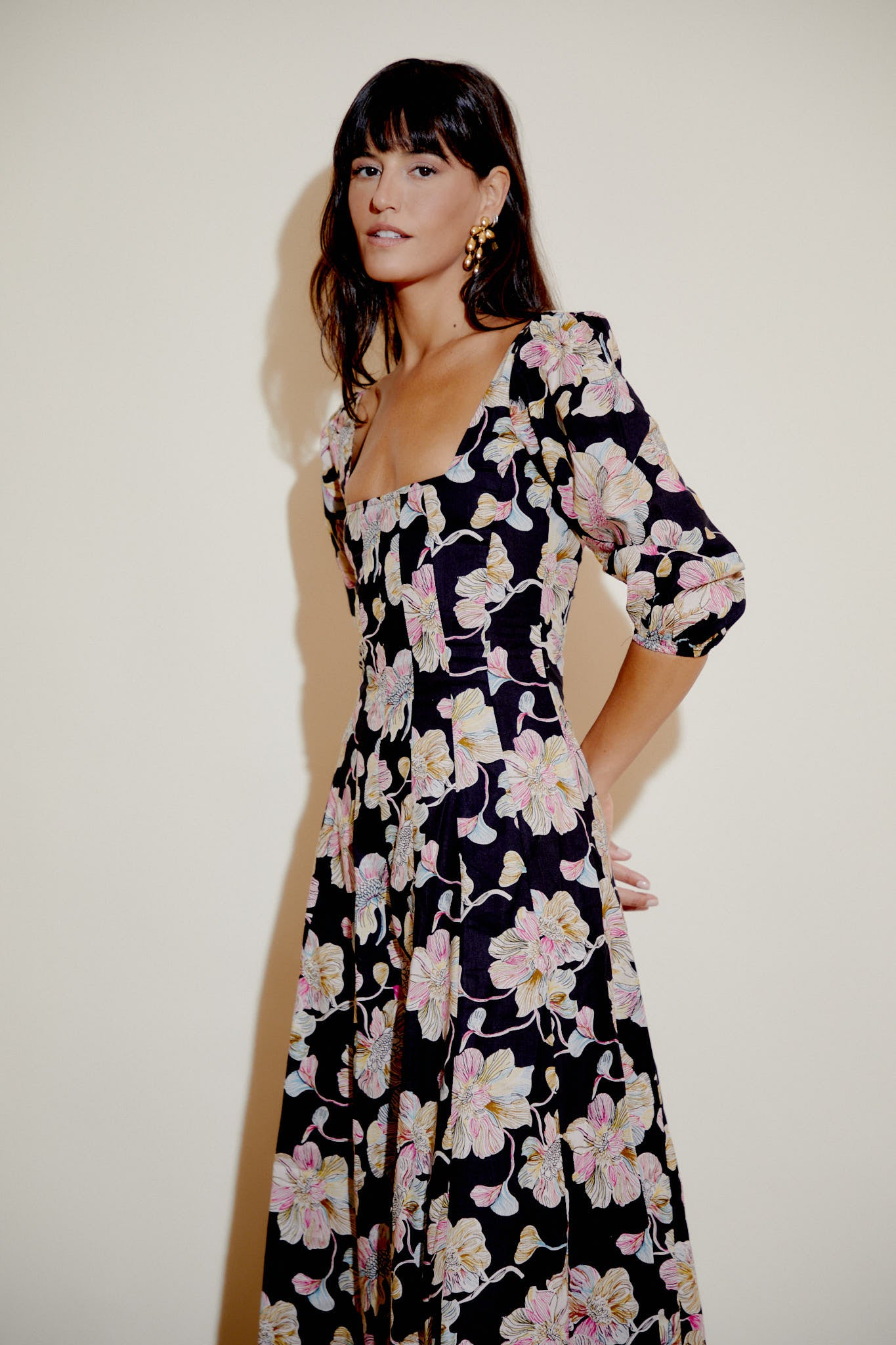 Aurelia dress, black base with pink floral print, square neck and elbow puff sleeves