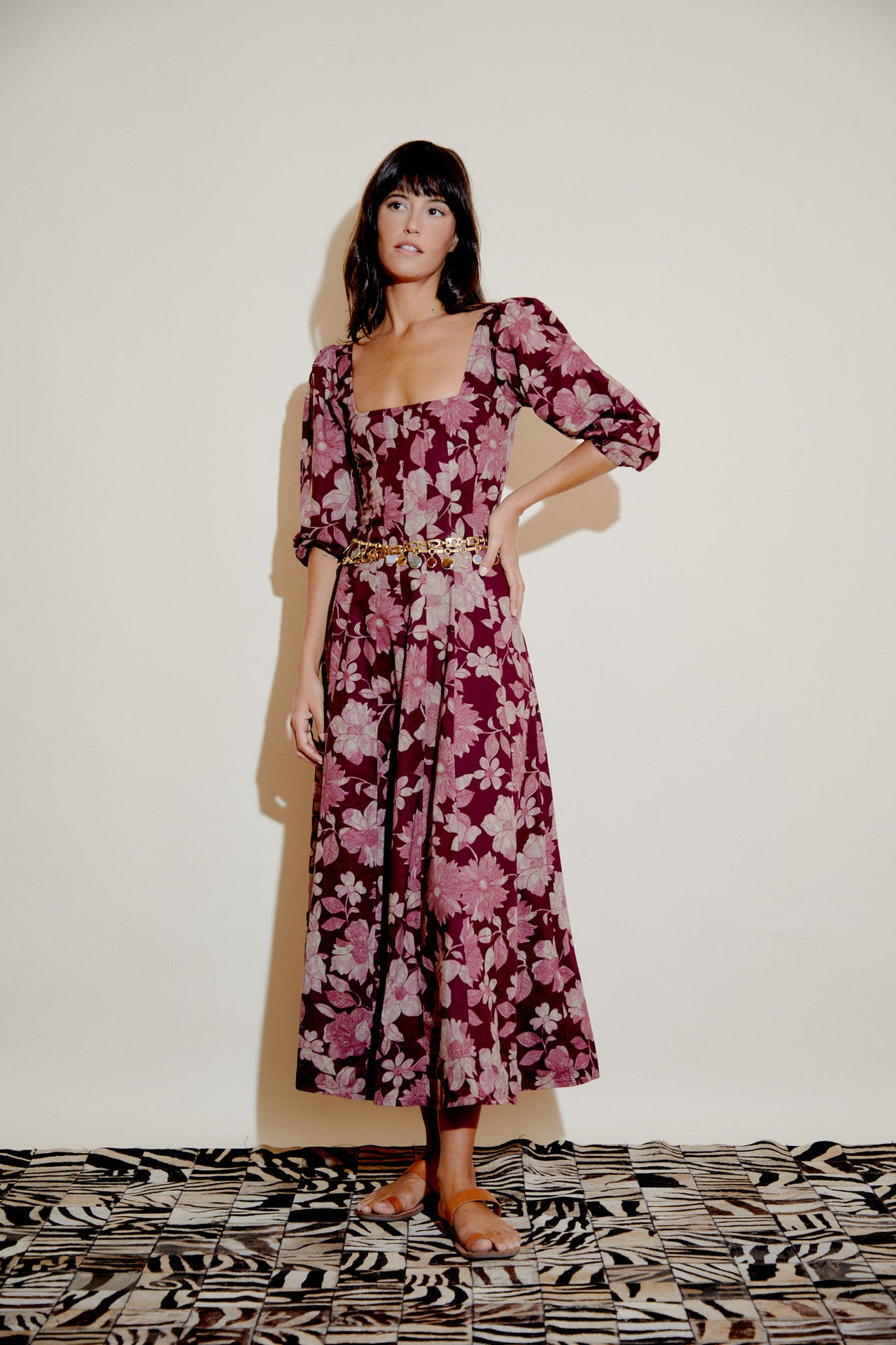 Aurelia plum floral midi dress with square neckline, waist tie, and puff sleeves