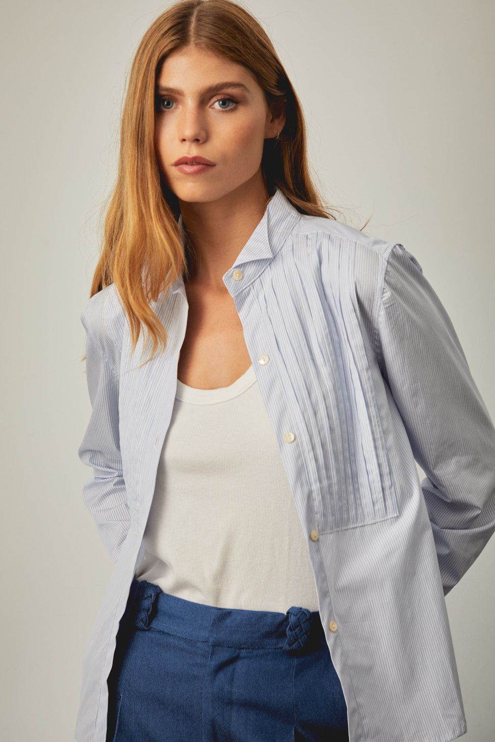 Light blue striped shirt with stand collar and button-front placket, long sleeves