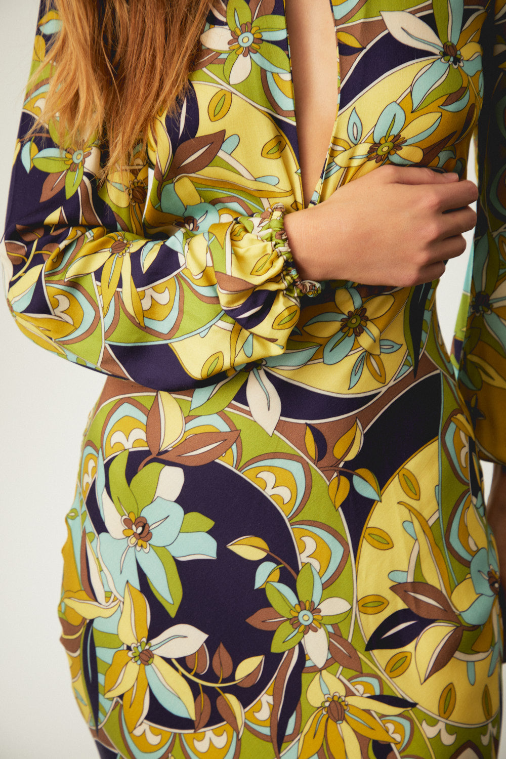 Floral maxi dress close-up: yellow, navy, and green patterned bodice