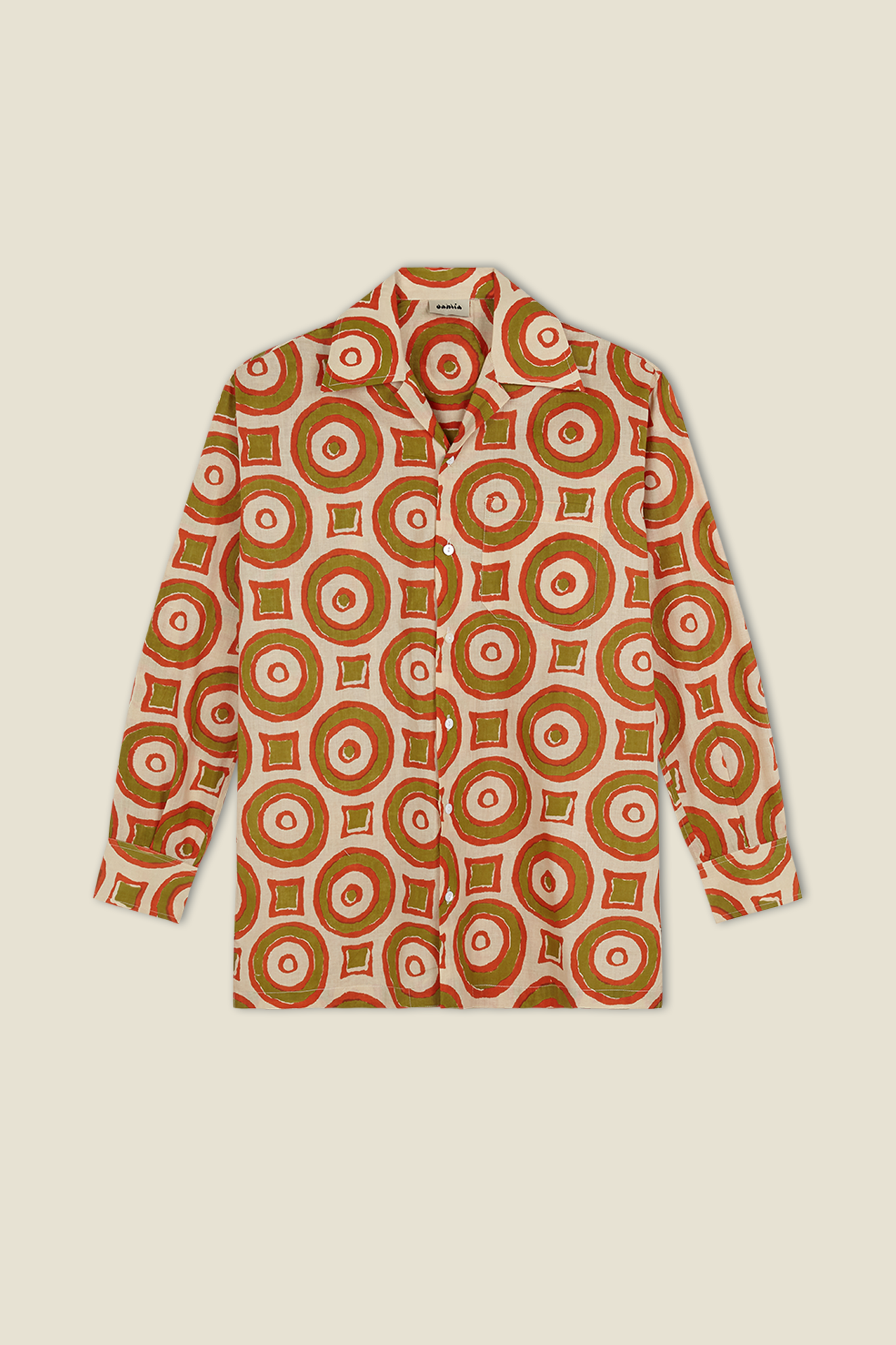 Orange button-up shirt with circular pattern, long sleeves, pointed collar