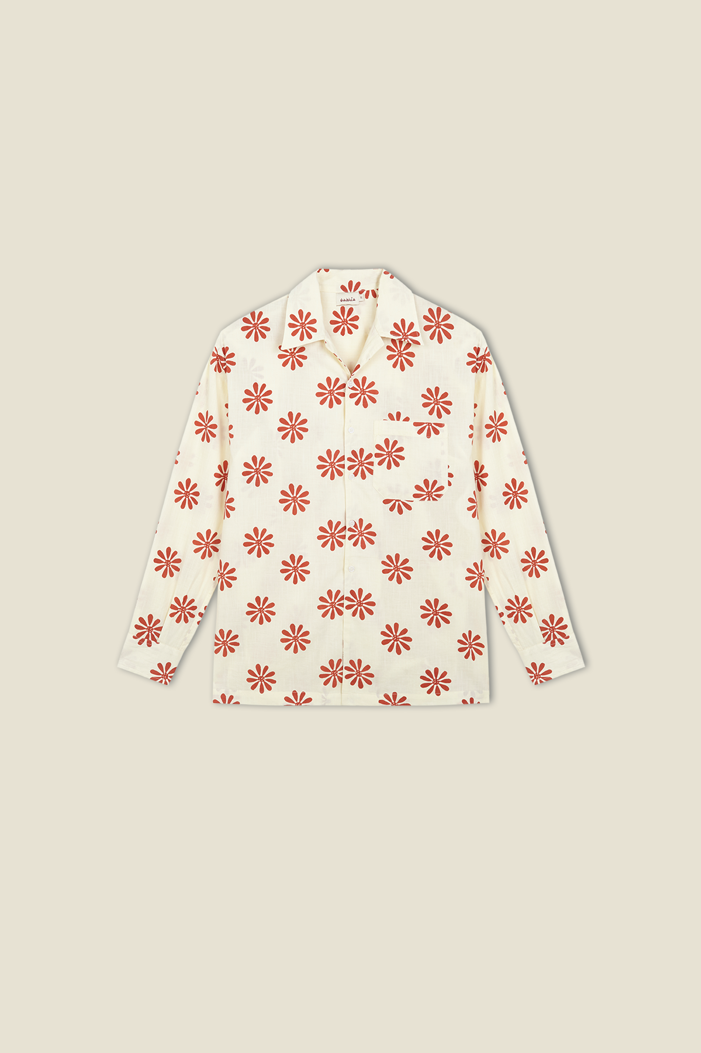 Cream button-up shirt with red flower burst print, long sleeves and pointed collar