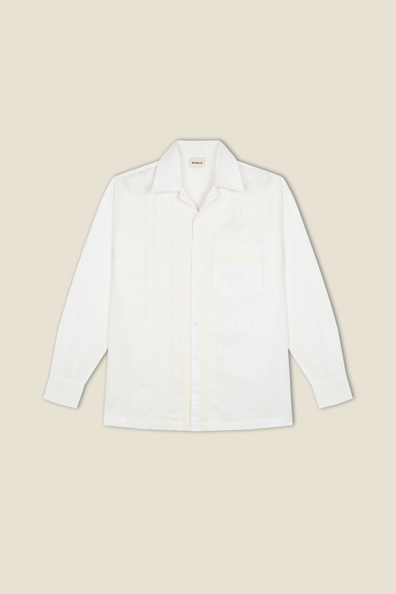 White button-up shirt with pointed collar, chest pocket, and vertical stripe texture.