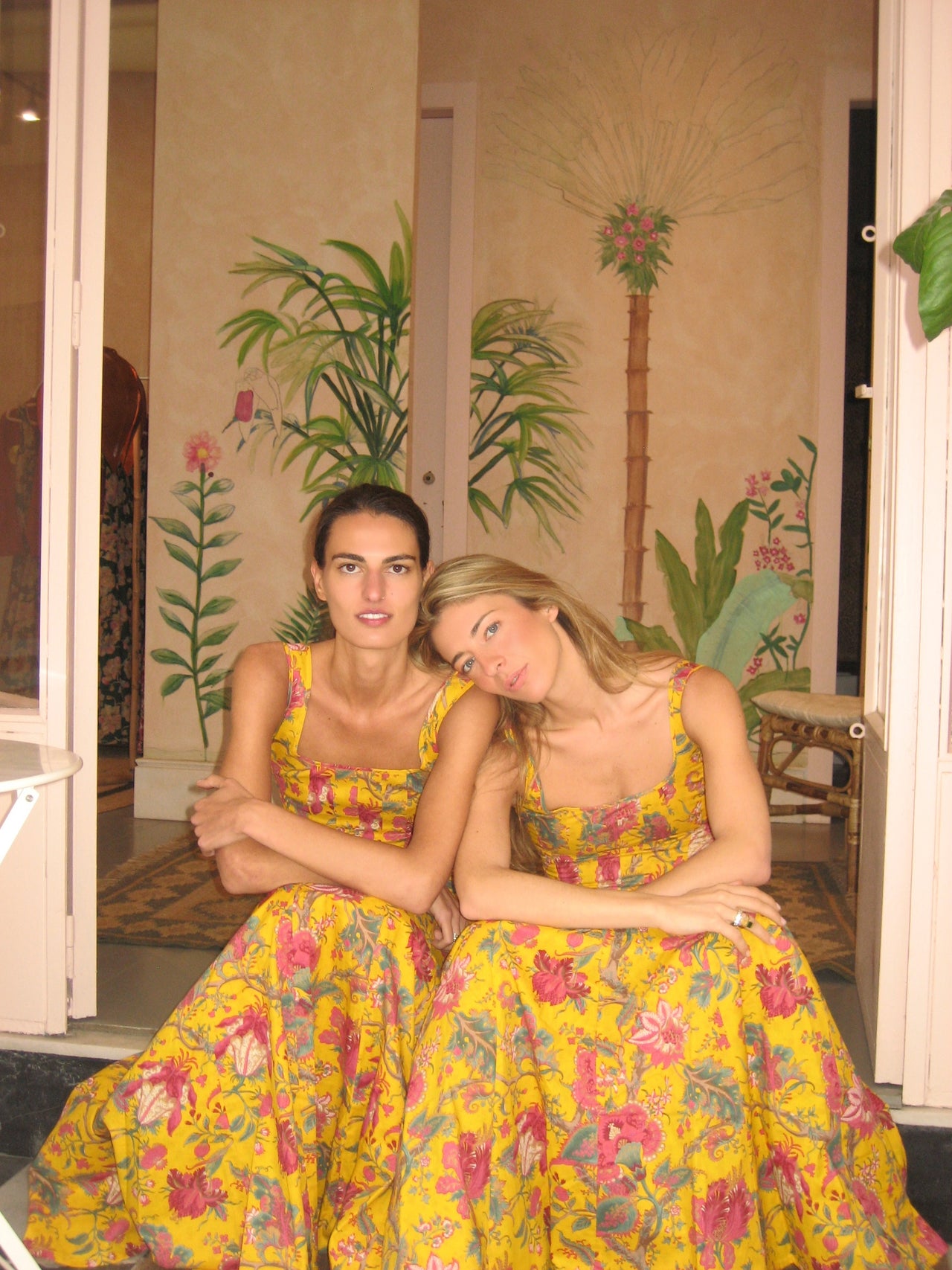 Yellow floral sleeveless dress with square neck, gathered skirt, fuchsia braided belt