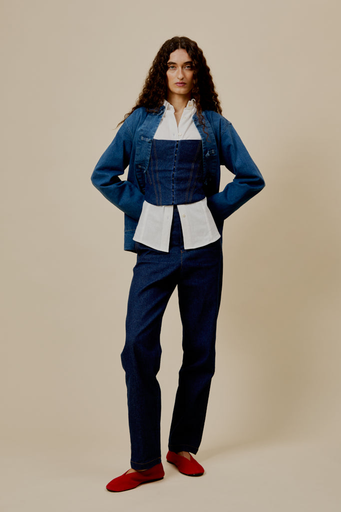 Denim corset bodice with square neckline, button front, and fitted vertical seams