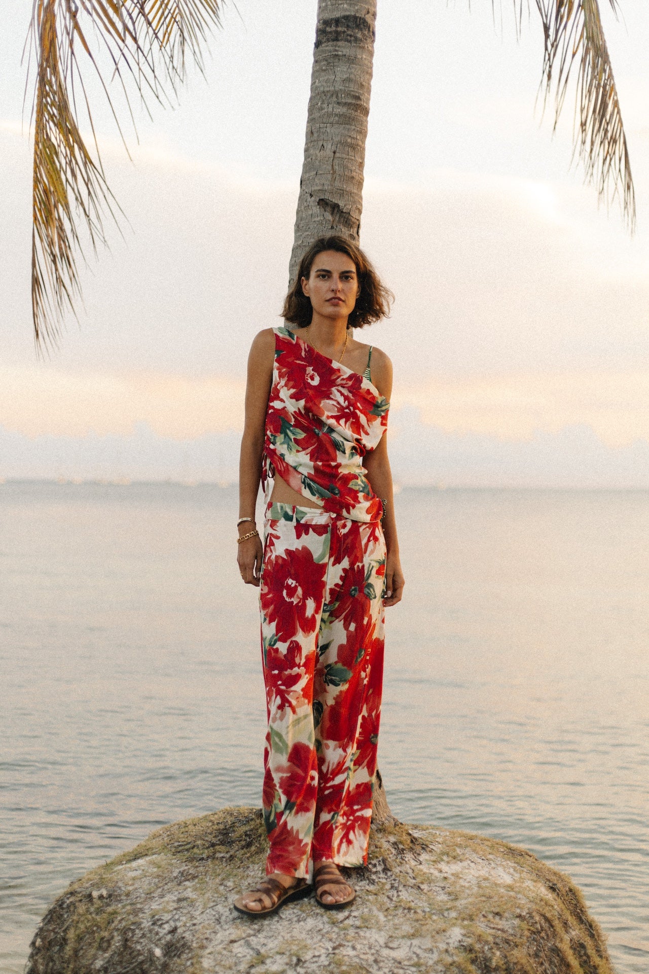 Floral sleeveless top with red and white blossoms, wide shoulder straps