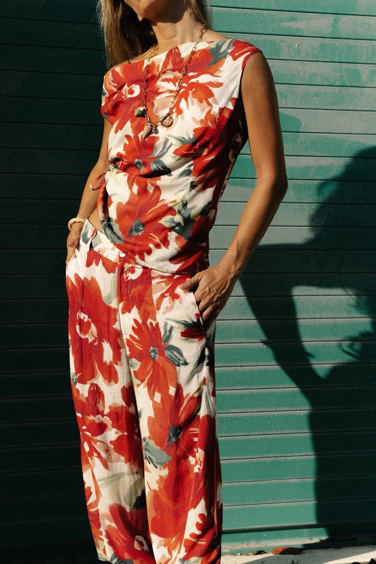 Floral print wide-leg trousers in red, white, and green