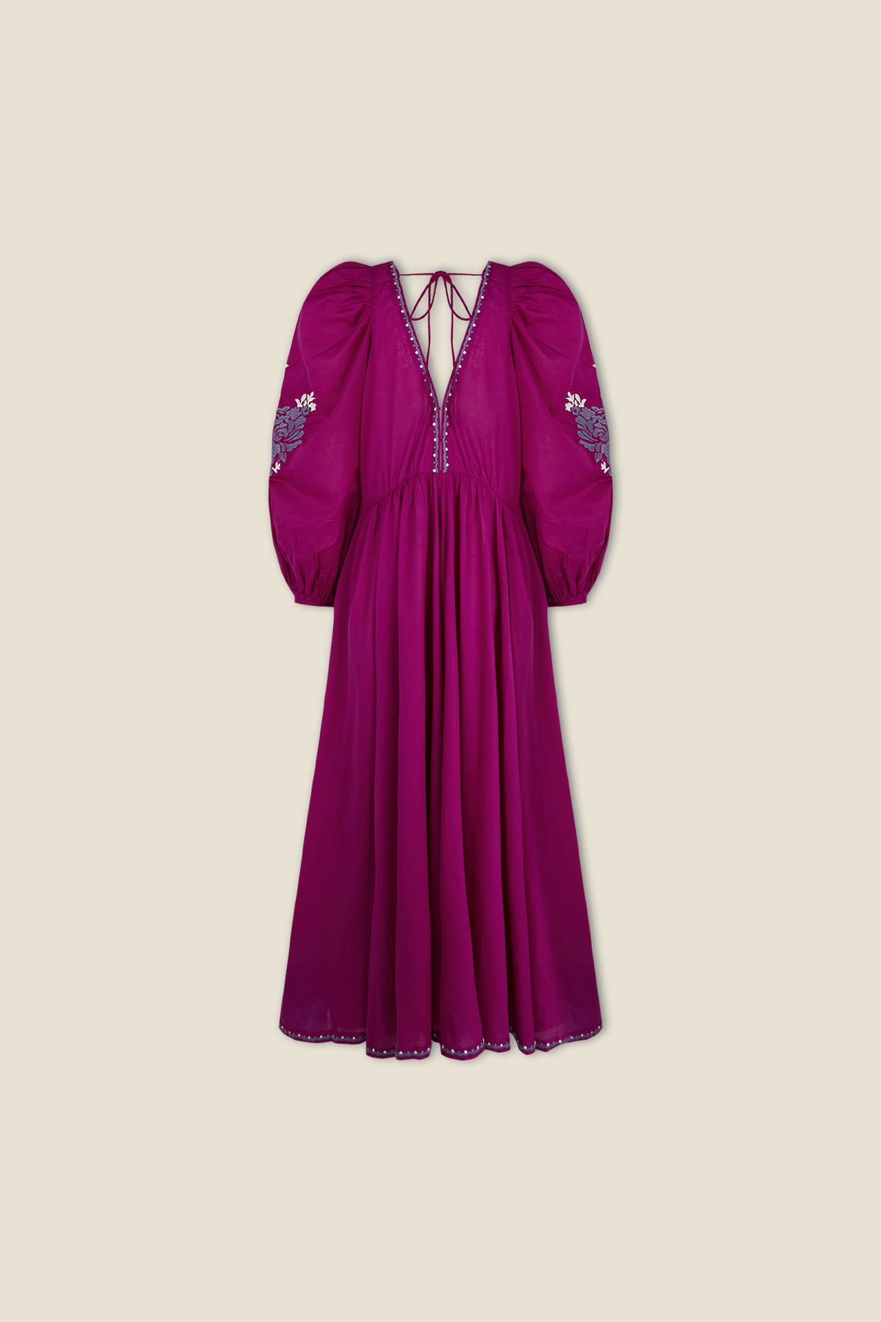 Magenta Isla dress with puff sleeves, V-neck trim, embroidered hem, and tiered skirt