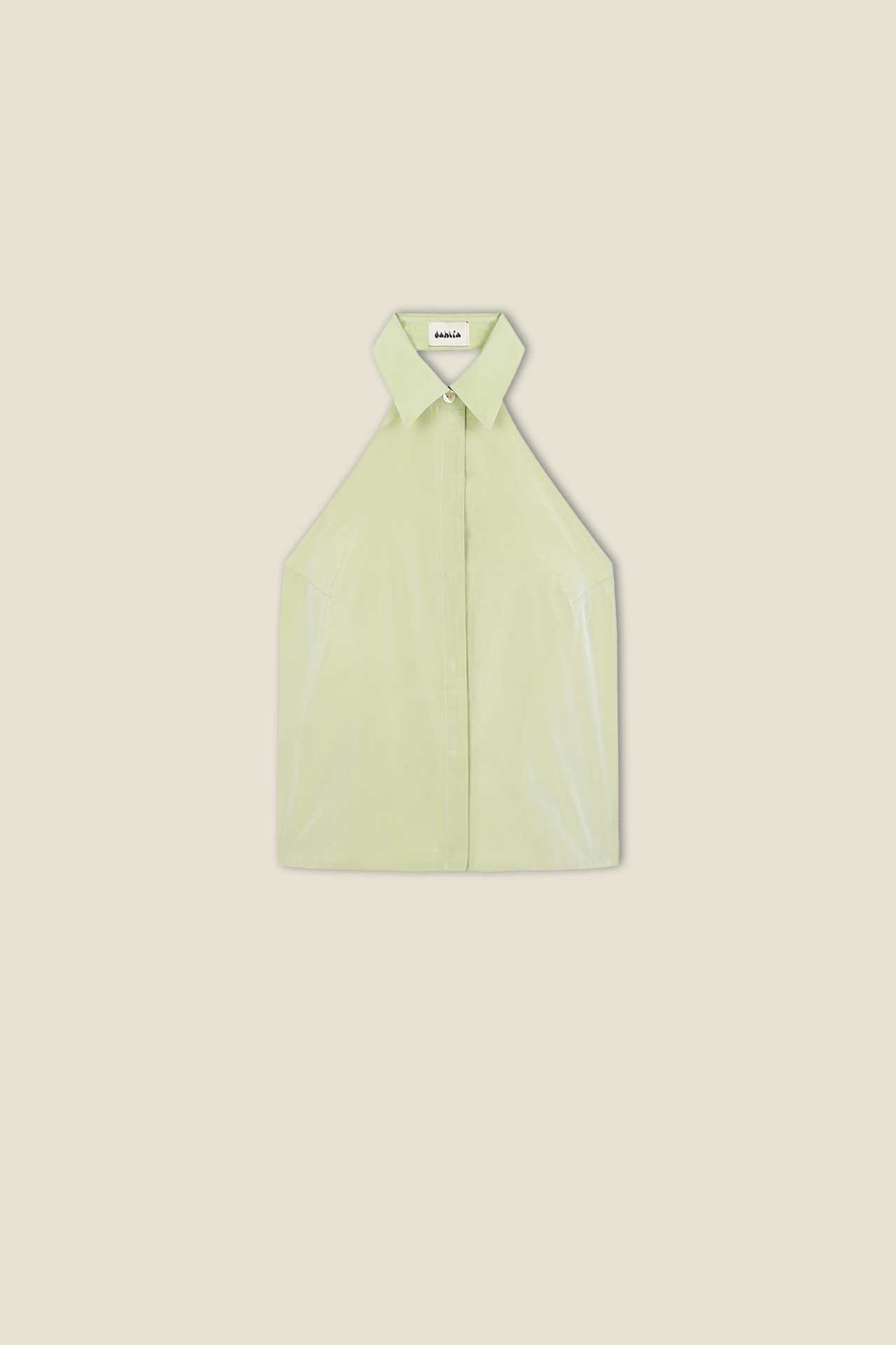 Green sleeveless button-up top with pointed collar and button front