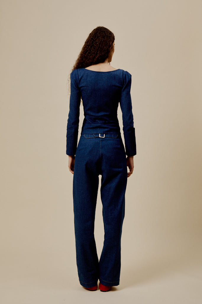 Dark blue denim top back view with long sleeves and waist-length fitted cut